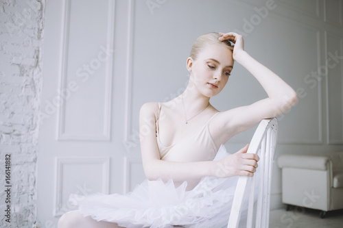 Young ballerina in ballet class photo