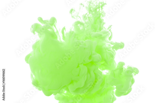 Yellow, blue, aquamarine, pink, green acrylic colors. Ink swirling in water. Color explosion