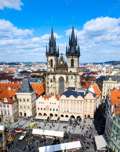 Tyn Church and crowded Stare Mesto (Old Town) in Prague on a sunny day