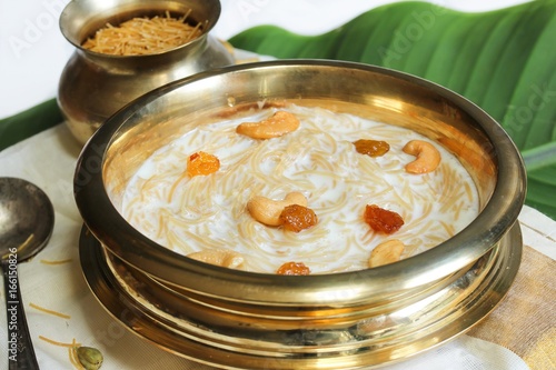 Close up of Semiya Kheer served in Traditional Brass vessel, selective focus