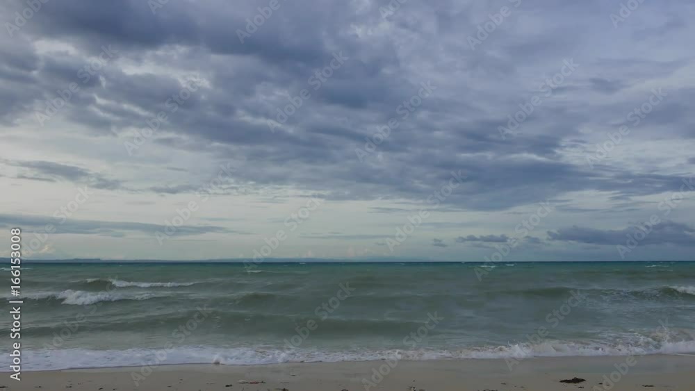 An overcast day at the Bantayan Island white sand beaches, with rough sea and big waves. An overcast day at the Bantayan Island white sand beaches, with rough sea and big waves.