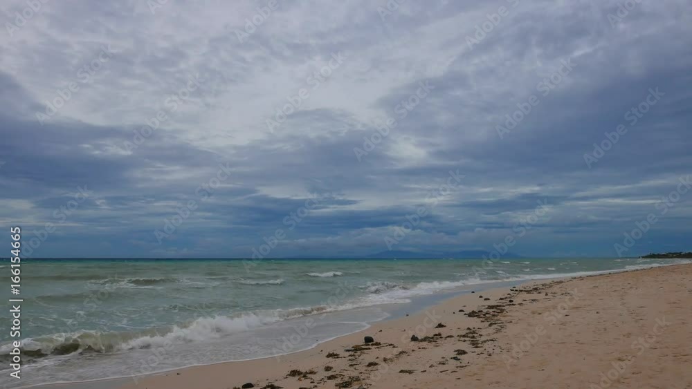 A wavy, overcast afternoon at the white sand beaches of Bantayan Island. A wavy, overcast afternoon at the white sand beaches of Bantayan Island.
