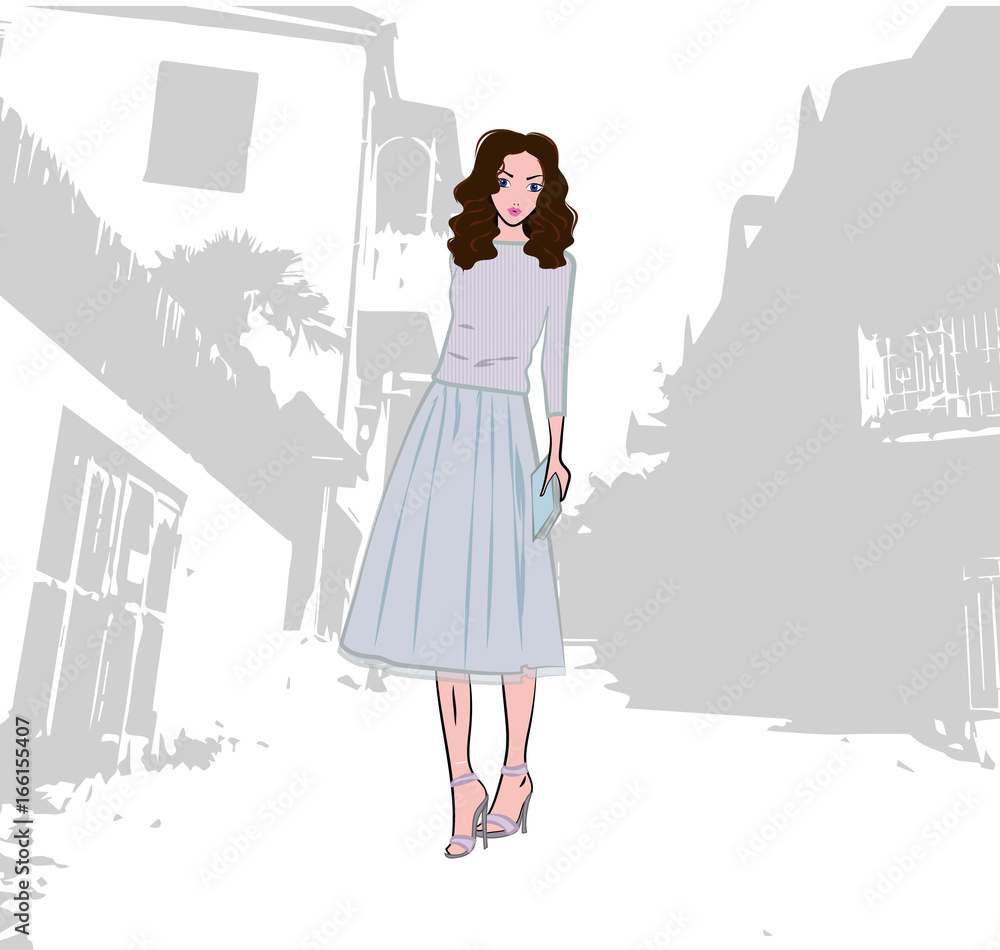 Fashionable cute girl dressed in knitted top and skirt in the city Fashionable cute girl dressed in knitted top and skirt in the city