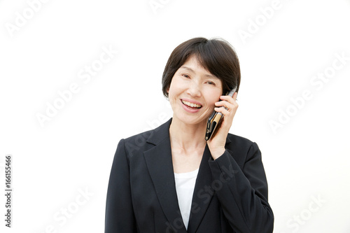 ミドル女性 ビジネス 電話