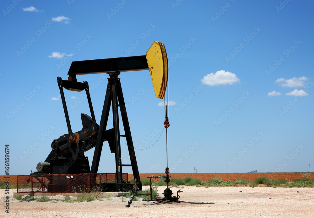 Oil Pump on the field. Oil industry equipment Oil Pump on the field. Oil industry equipment