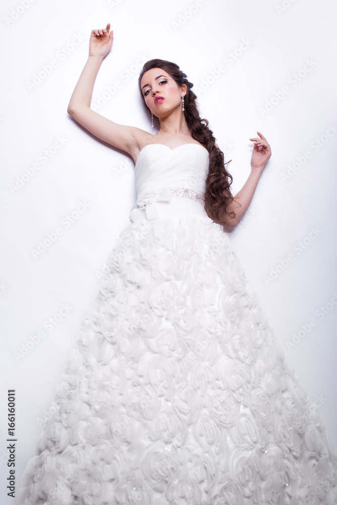 Portrait of beautiful young woman bride in white Wedding Dress Portrait of beautiful young woman bride in white Wedding Dress