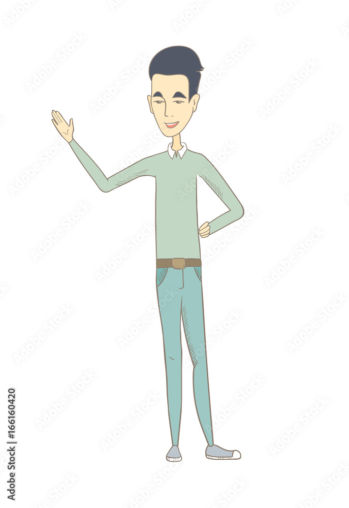 Young asian man pointing at something by his hand. Young asian man pointing at something by his hand.
