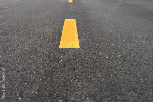 yellow line on asphalt road