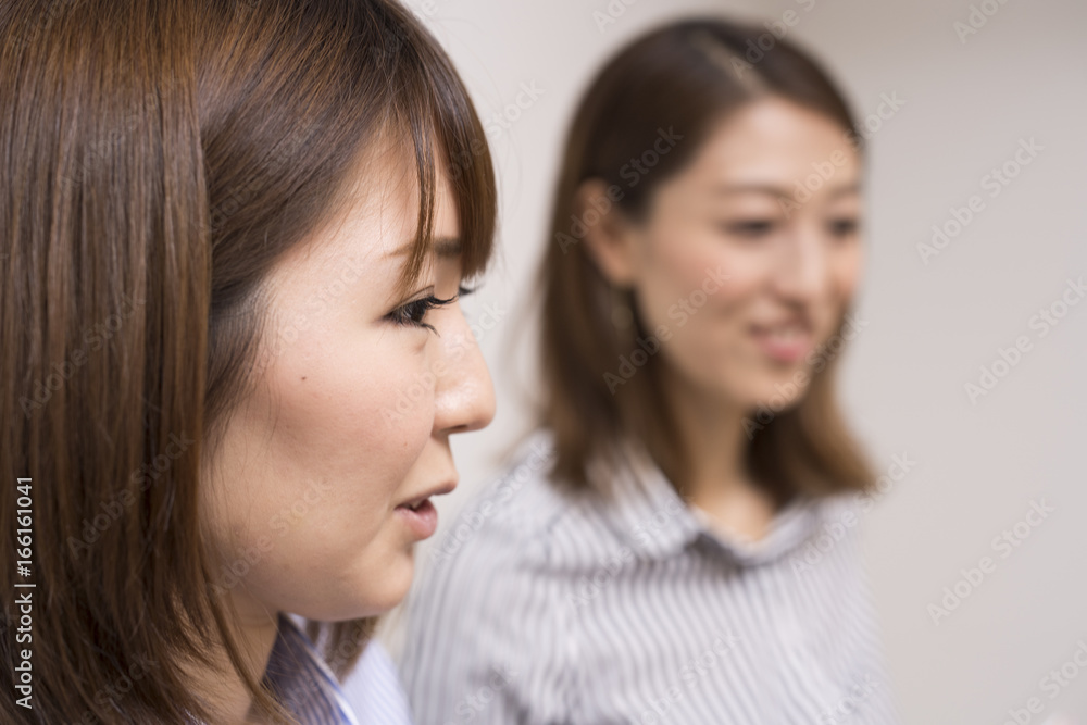 A profile of a working Asian woman A profile of a working Asian woman
