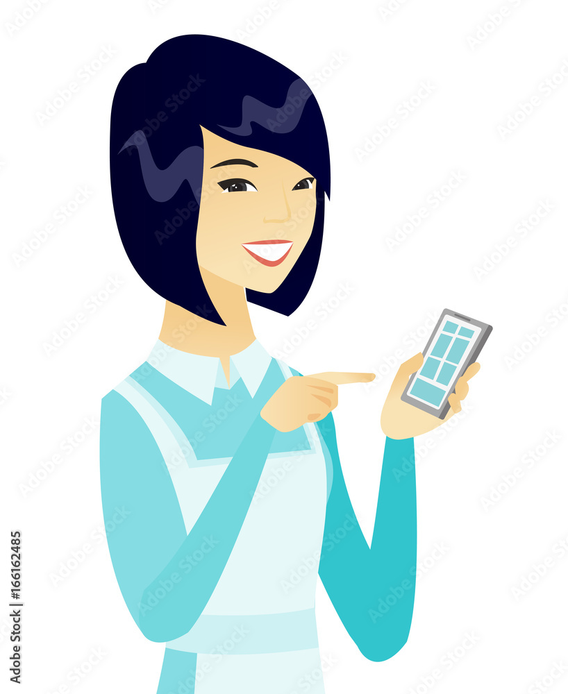 Young asian cleaner holding a mobile phone. Young asian cleaner holding a mobile phone.
