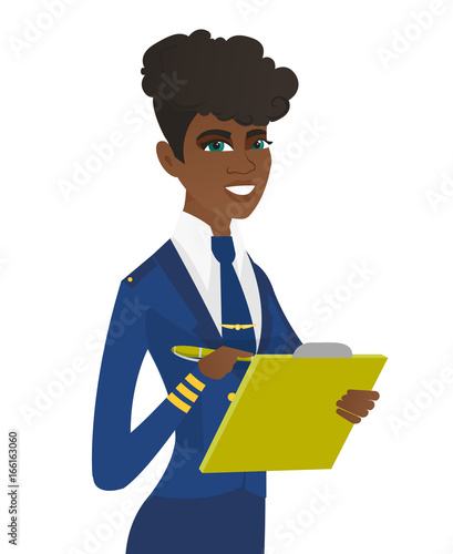 Young stewardess holding clipboard with documents.