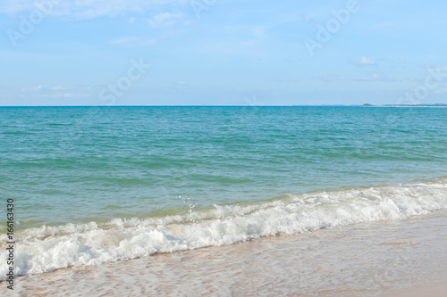 Wave of the sea on the sand beach