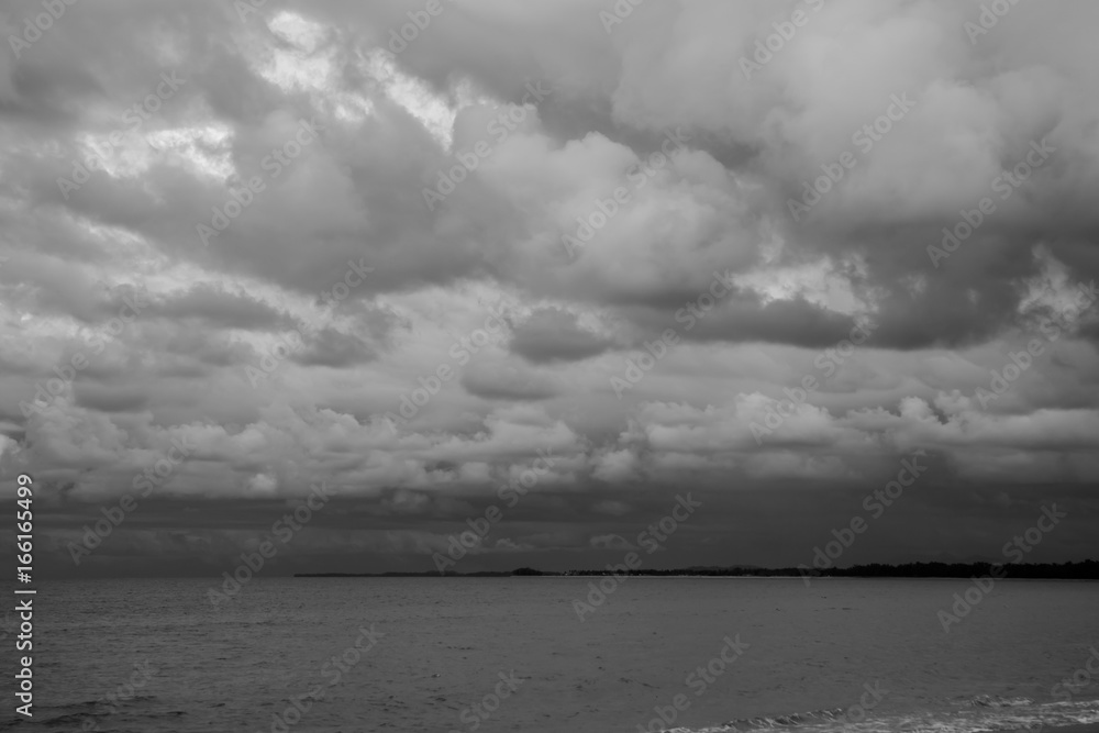 Fototapeta premium Black and white sky and clouds before rain coming at Thailand.