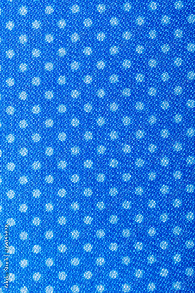Blue polka-dot table cloth top view