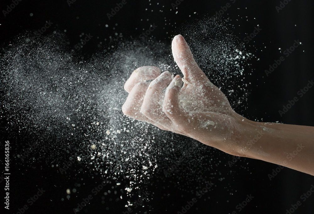 Hands in flour