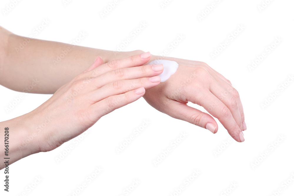 Female hand with sunscreen cream on hand on white background