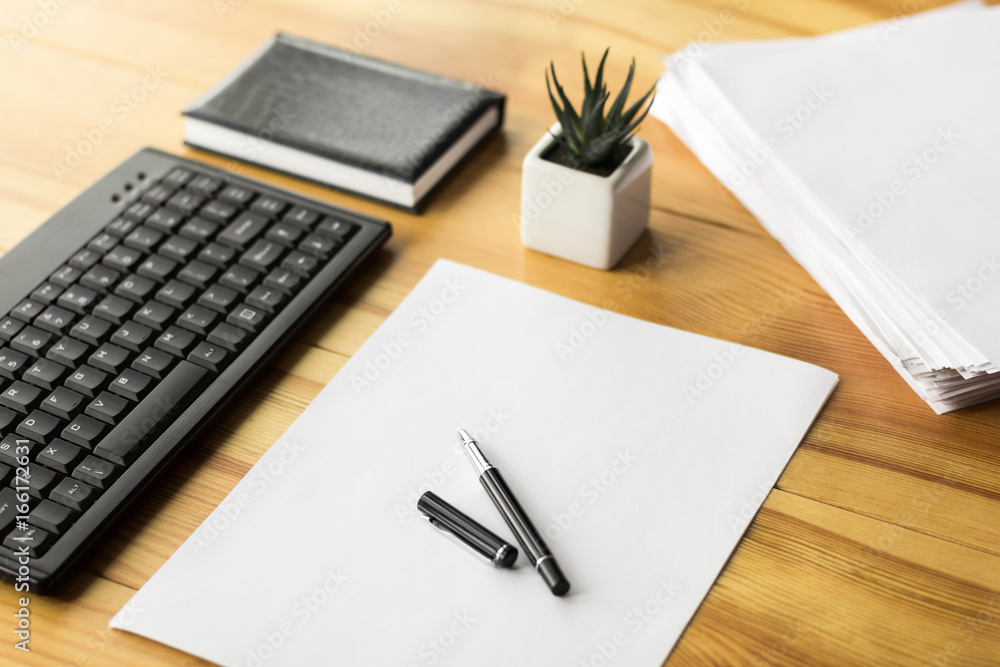 A modern working man's field, on a wooden table A modern working man's field, on a wooden table