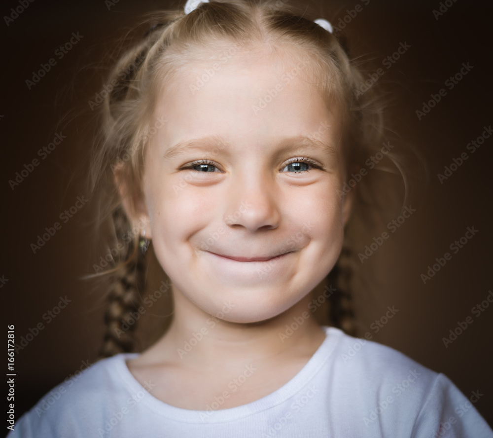 Close-up portrait of adorable little girl. Selective focus with shallow depth of field. Close-up portrait of adorable little girl. Selective focus with shallow depth of field.