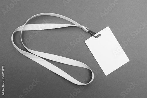 Blank badge with lanyard on grey background