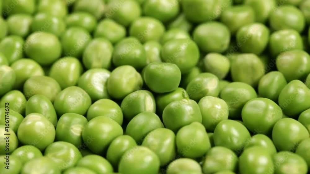 Sliding in front of shelled peas layer - abundance concept, closeup, sliding camera Sliding in front of shelled peas layer - abundance concept, closeup, sliding camera