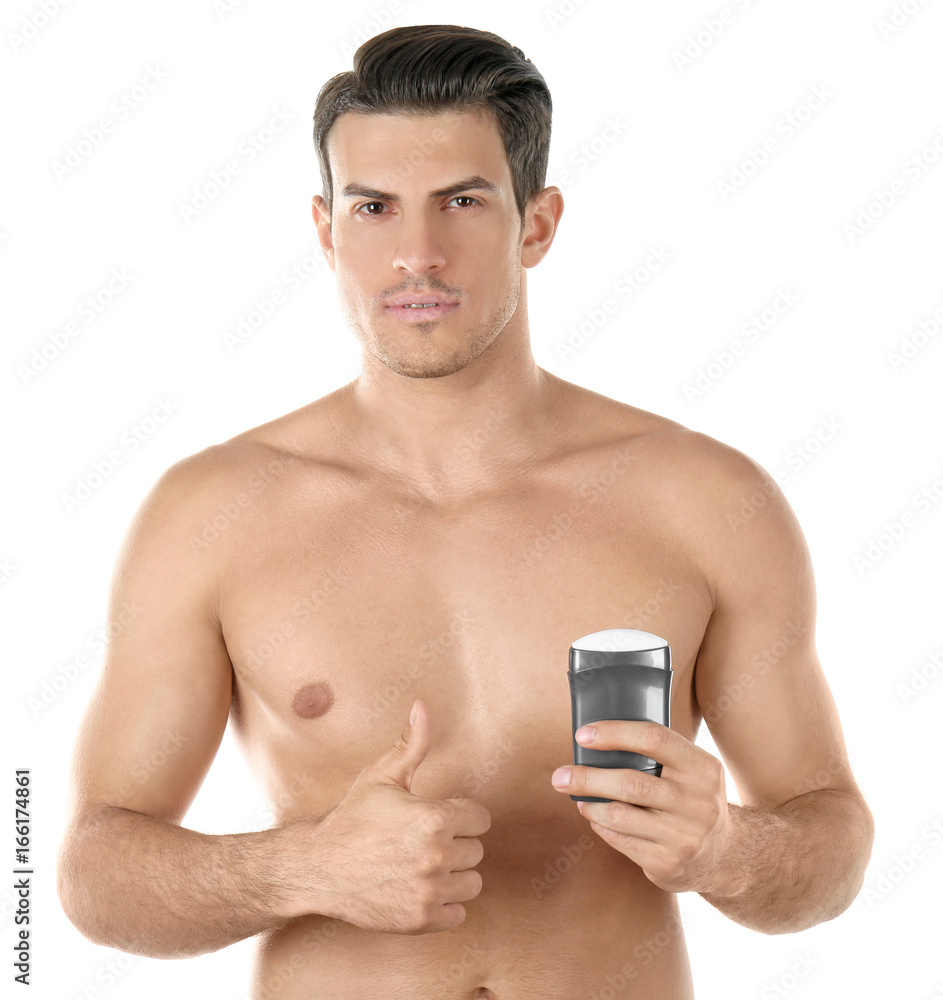 Handsome young man with deodorant on white background Handsome young man with deodorant on white background