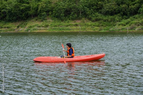 Man paddling in a kayak boat in Thailand © geargodz