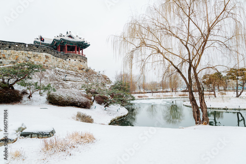 Korean traditional architecture Hwaseong Fortress Banghwasuryujeong at winter in Suwon, Korea photo