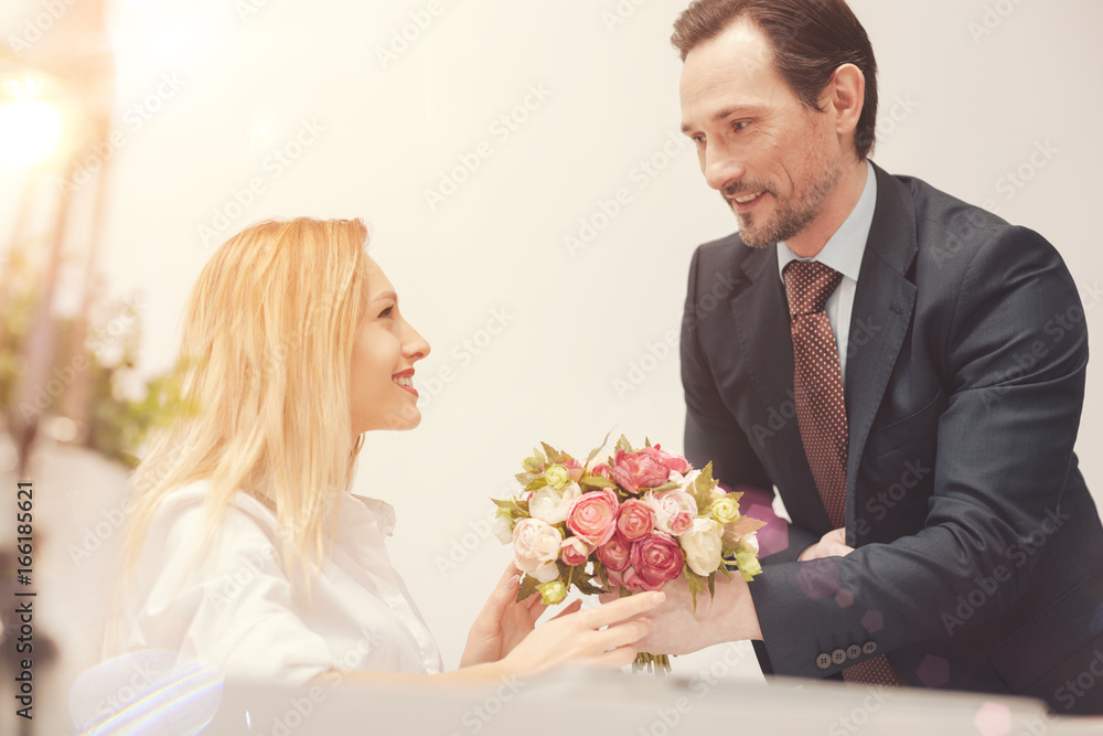 Gallant charming man greeting his colleague Gallant charming man greeting his colleague