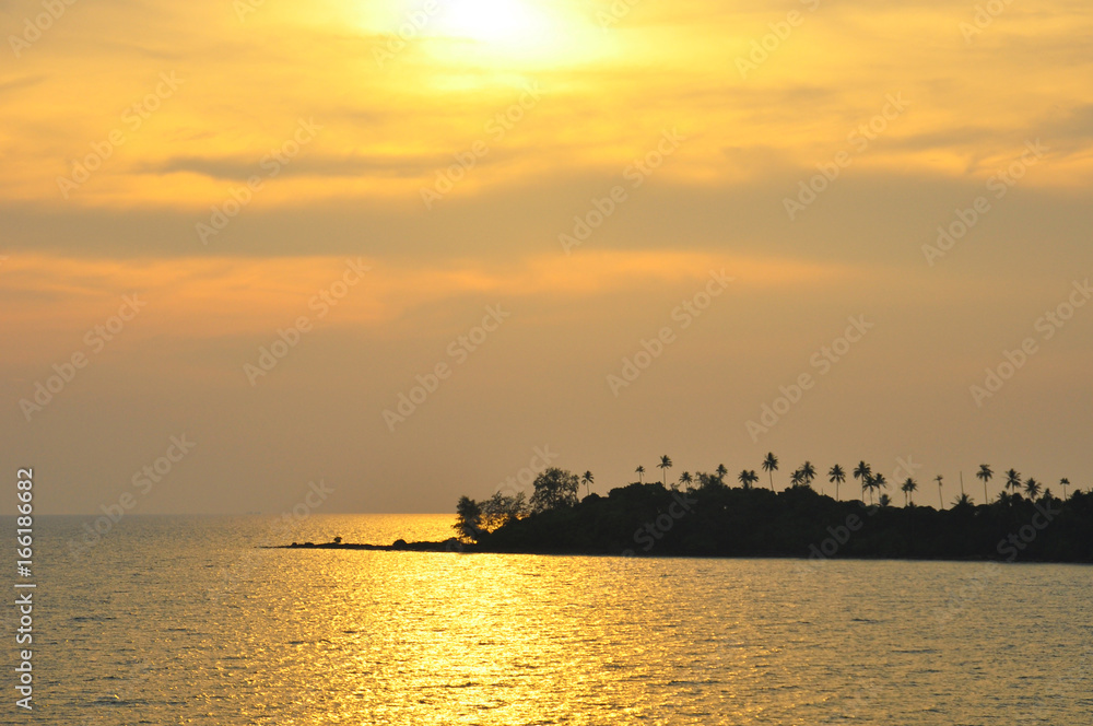 Island and sea in the sunset