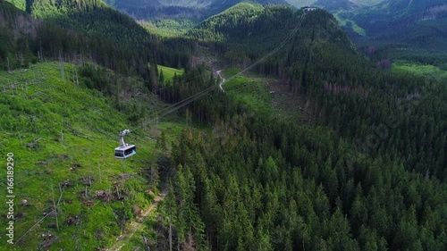 fligh over cableway in mountains