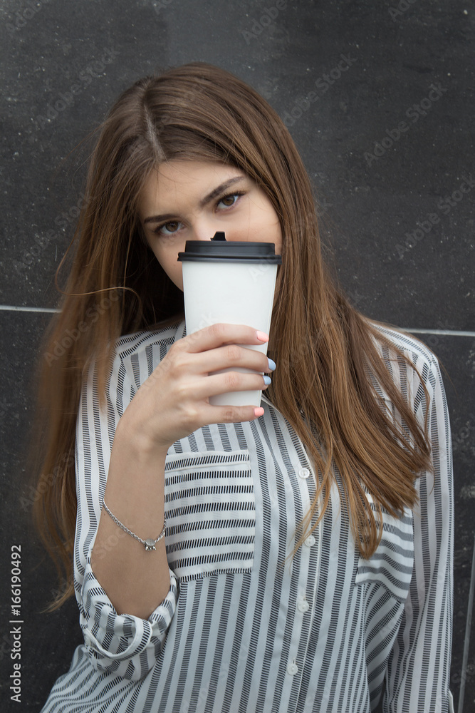 Beautiful girl with a glass of coffee Beautiful girl with a glass of coffee