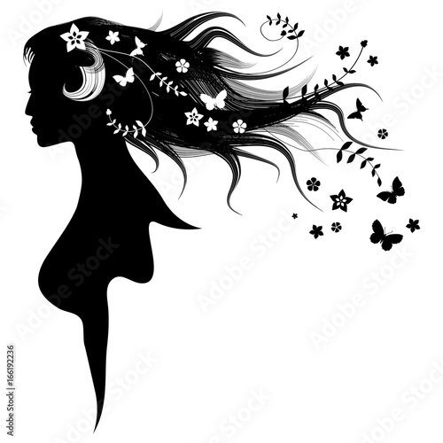 The beautiful girl with dispelled hair and butterflies. Spring symbol