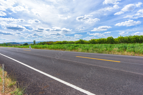 Asphalt road and countryside views