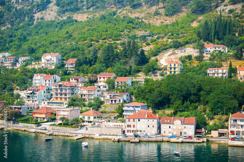 Picturesque view of houses along the waterfront at the bay of Kotor, Montenegro. © Nancy Pauwels