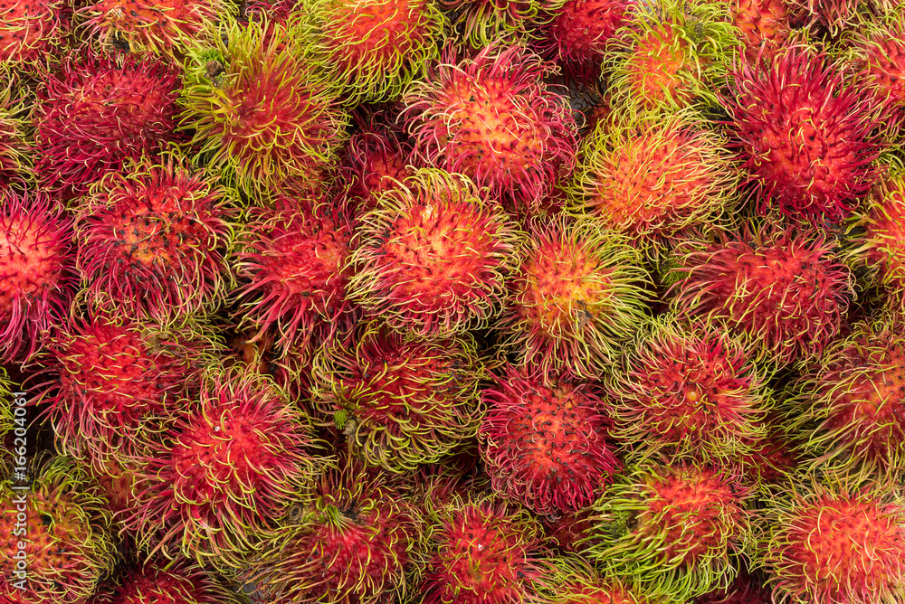 Fresh pile Rambutan from Rayong Thailand use for background design Fresh pile Rambutan from Rayong Thailand use for background design