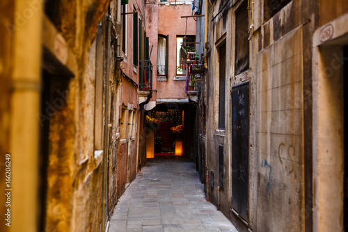 view of a small narrow street situated in a less visited part of italian city venice © Angelov