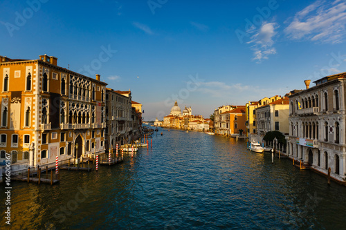 Venice. Cityscape image of Grand Canal in Venice, with Santa Maria della Salute Basilica in the background. © Angelov