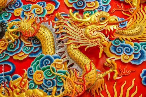 Chinese carving art of golden dragon © goldquest