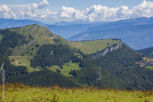Spectacular aerial view from Monte Baldo to the surrounding mountains, Riva del Garda, Italy