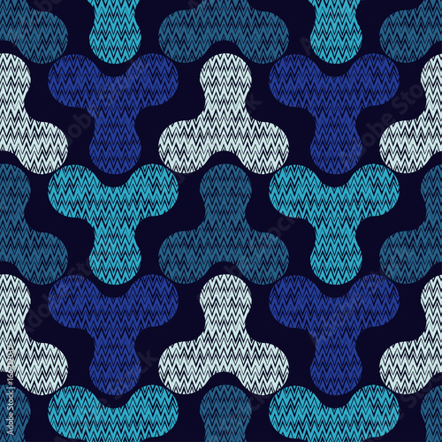 Seamless background with decorative spinners. Zigzag texture. Textile rapport.