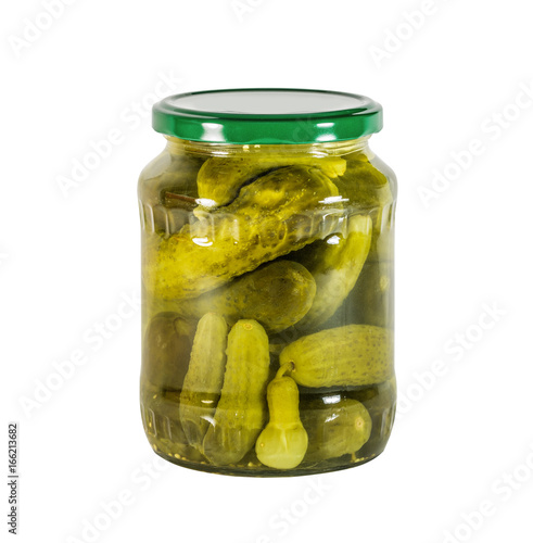 Pickles in a glass jar isolated on white