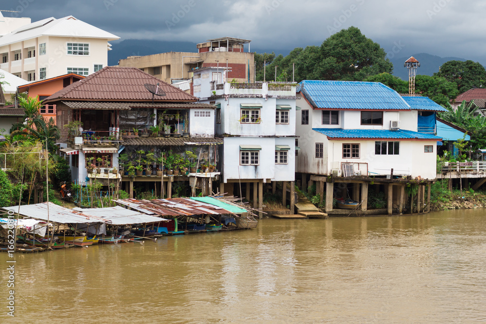 Waterfront urban house on morning ,community of Chantaburi Thailand