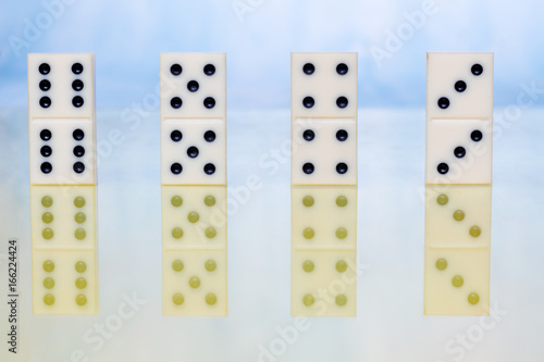 Dominoes on ligth background