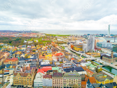 Aerial Malmo city view from above with harbour, turning Torso and the bridge on the horizon photo