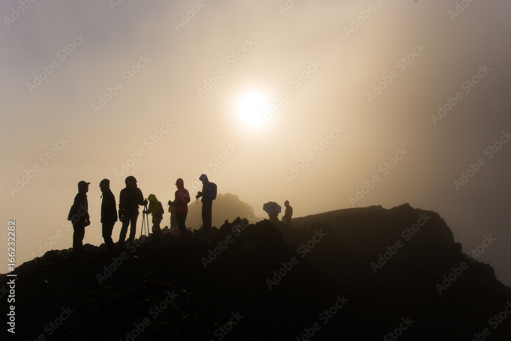 Unidentified mountaineers hike on their way to the peak. The mountain is the second highest volcano in Indonesia and rises to 3726 meters. Unidentified mountaineers hike on their way to the peak. The mountain is the second highest volcano in Indonesia and rises to 3726 meters.