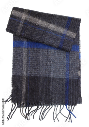 Dark warm woolen winter man's scarf with a fringe of threads.
