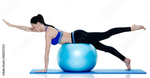 one caucasian woman exercising fitness pilates exercices isolated on white background photo