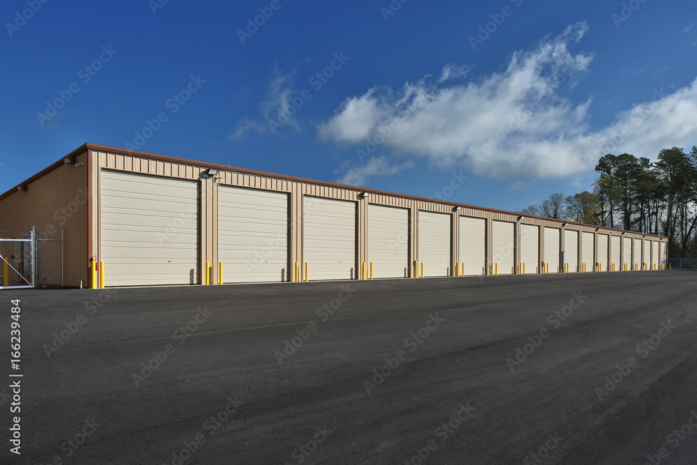 Long row of storage pods containers garages during the day