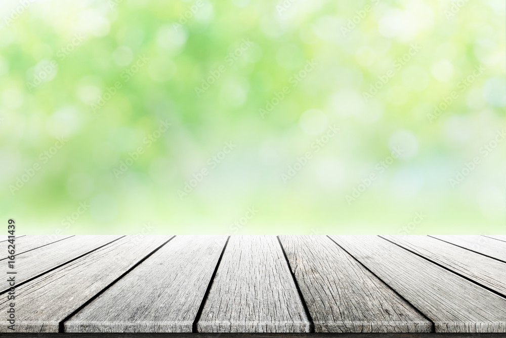 Empty wooden table with party in garden background blurred. Empty wooden table with party in garden background blurred.