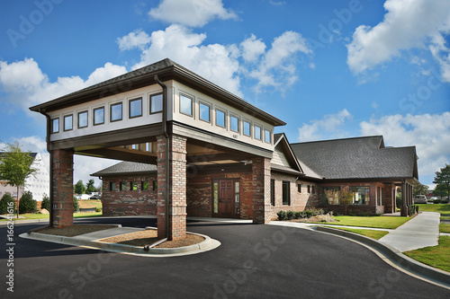 Brown Brick Recreational Executive Office Dentist Doctor's Office Building Exterior with Portico Entrance